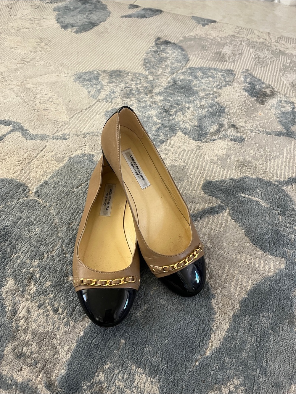 Saks Fifth Avenue Tan Leather Flats with Black Patent Cap Toe and Gold Chain